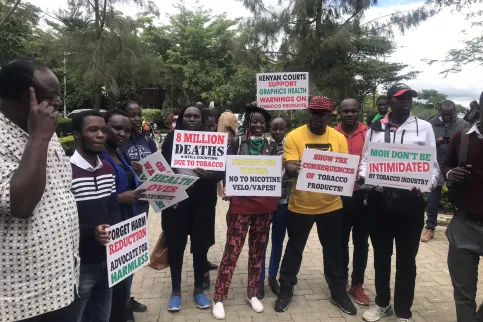 Youth tobacco control activists from the Kenyan tobacco control alliance (KETCA) protesting against tobacco industry interference with posters and banners. 