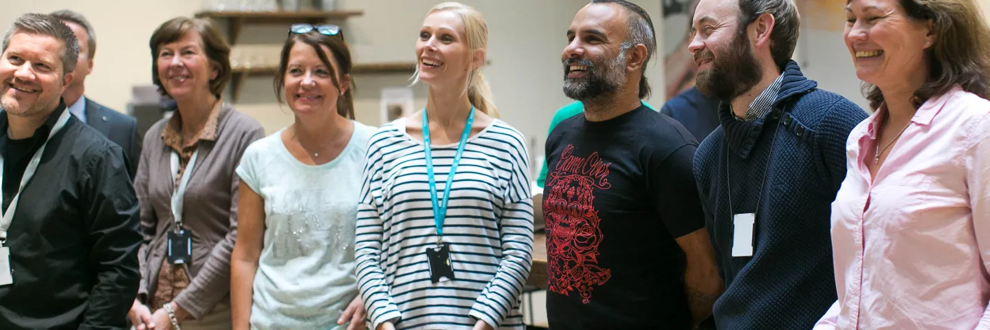 Norwegian Cancer Society staff talking together at their headquarters