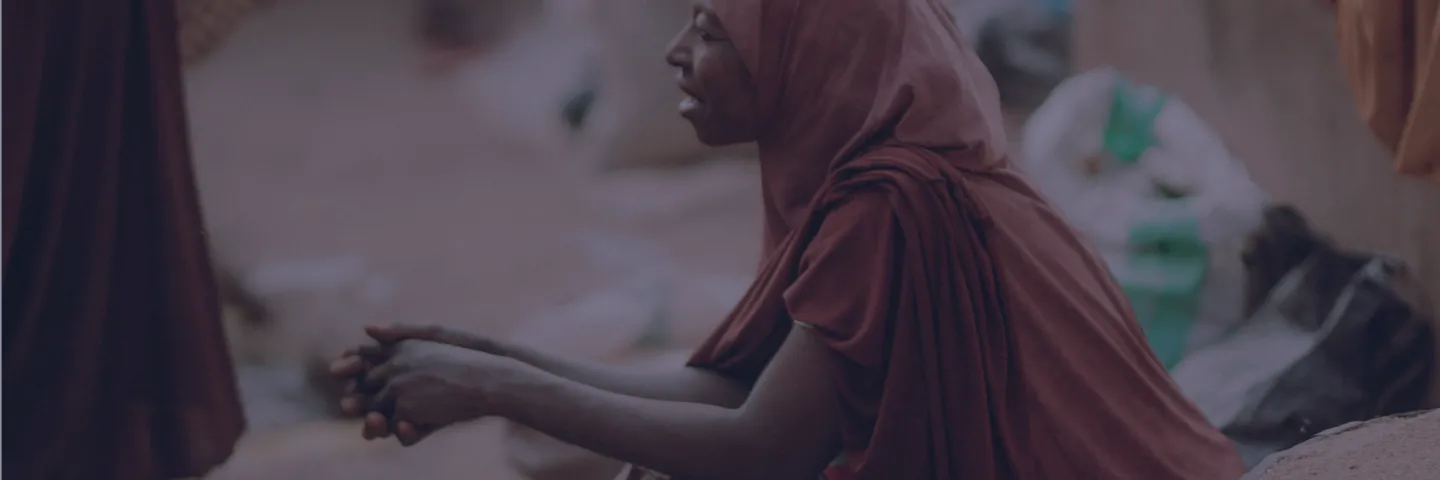 Women sitting at a market place