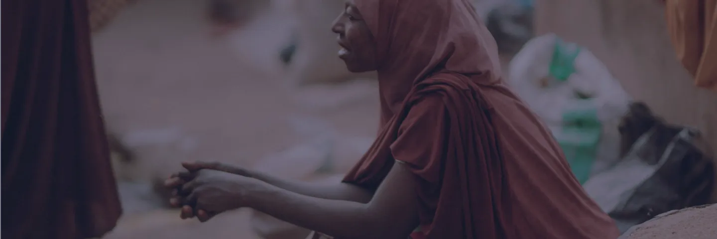 Women sitting at a market place