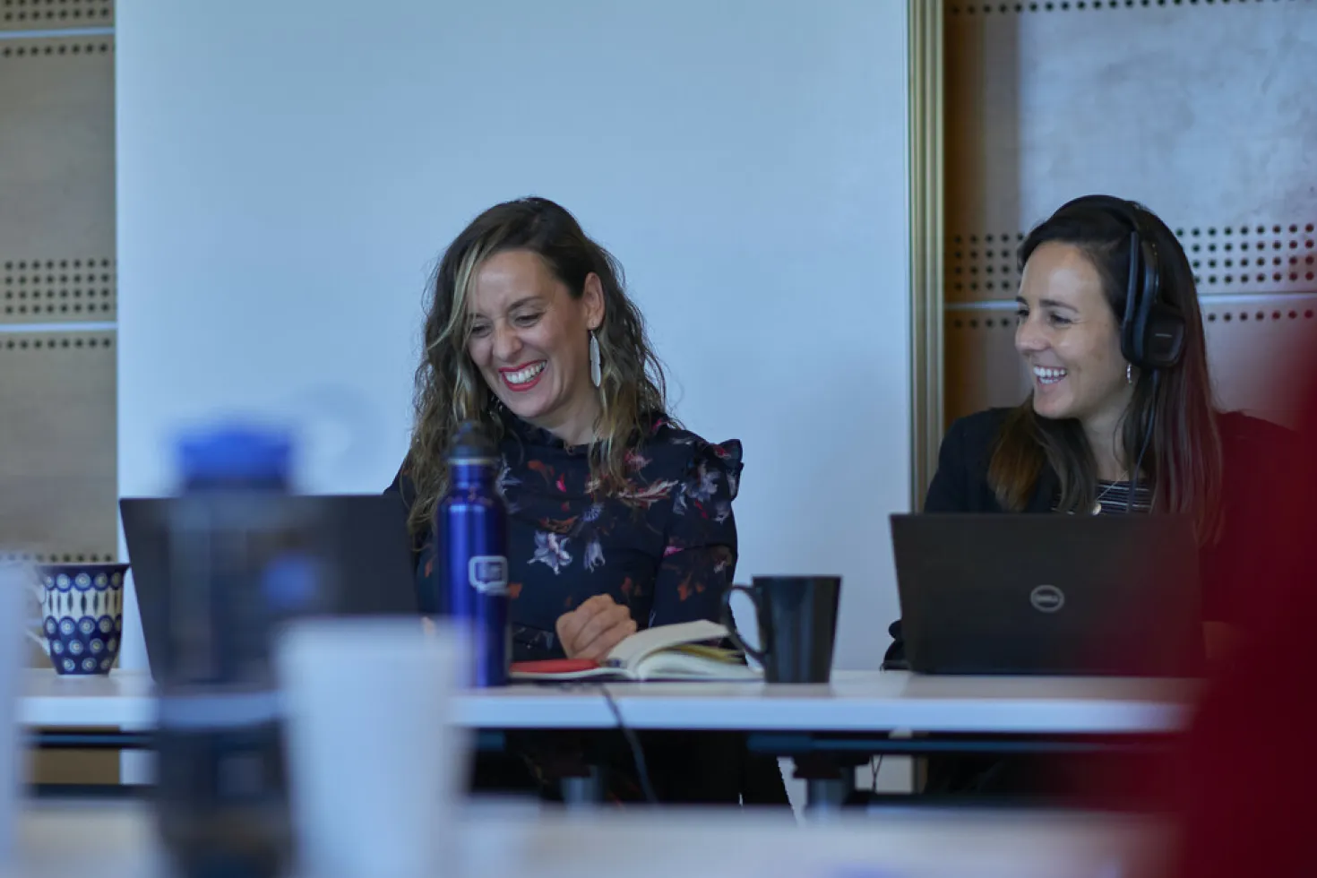 UICC Staff members exchange smiles as they watch the virtual World Cancer Leaders' Summit 2021