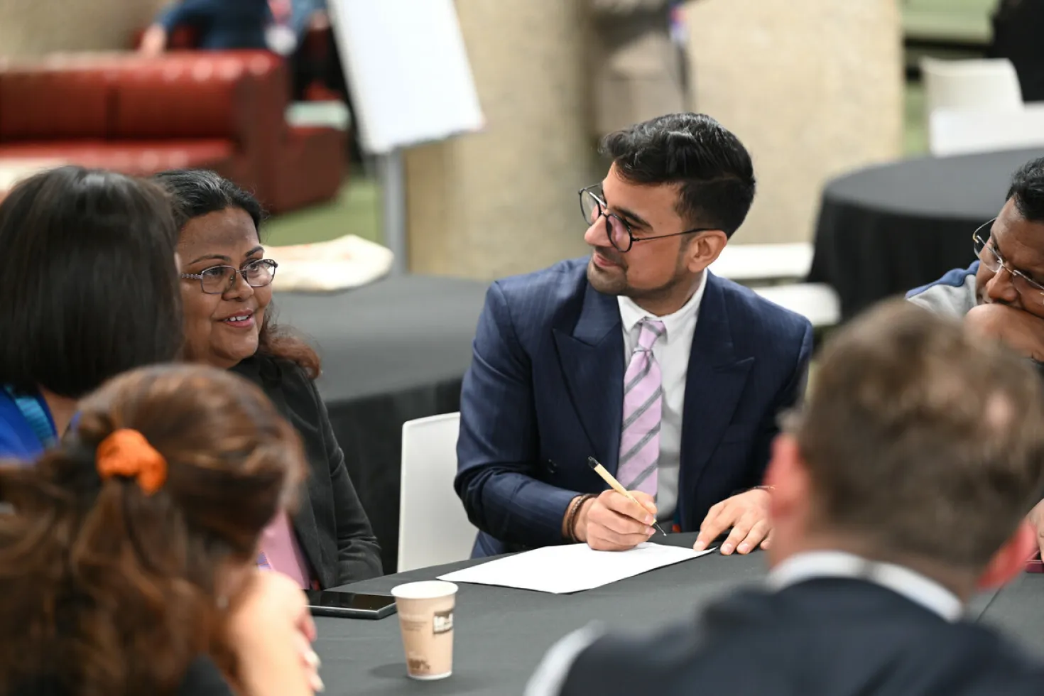 Participants in a group discussion at the World Cancer Congress 2022