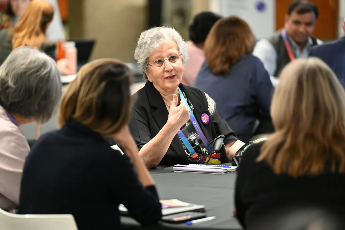 Attendees network and discuss at the World Cancer Congress 2022