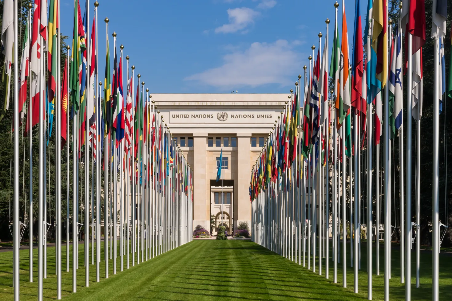 Flags in front of the United Nations building in Geneva, Switzerland