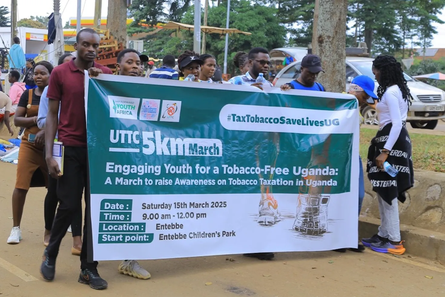 Community members march in support of the excise tax increment on tobacco products in Entebbe Municipality, Uganda