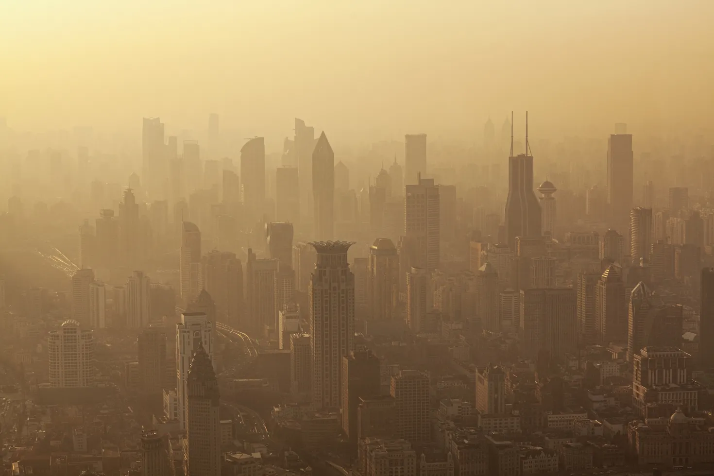 Air pollution seen over Shanghai's Puxi District buildings at dusk 