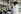 Black woman in lab coat running analyses