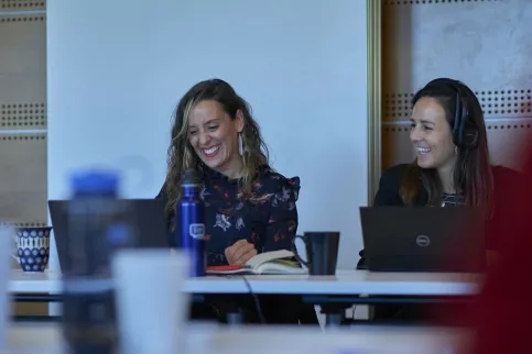 UICC Staff members exchange smiles as they watch the virtual World Cancer Leaders' Summit 2021