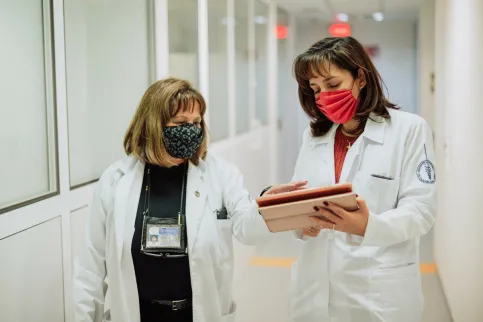 Medical staff looking at some files
