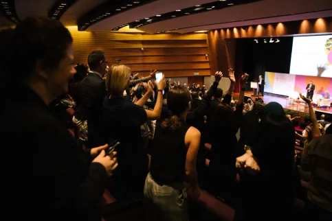 Participants cheering at the World Cancer Congress 2018