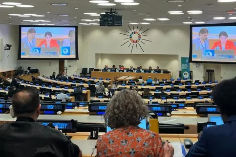 Auditorium with two large screens above the speakers at the UN in New York for the high-level meeting on universal health coverage