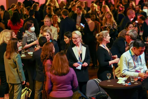 Participants at the World Cancer Congress interacting socially