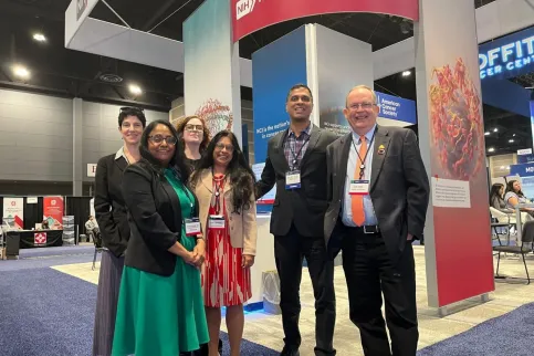 Diverse group of men and women at a cancer conference