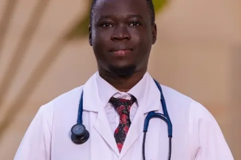 Headshot of a young Black doctor