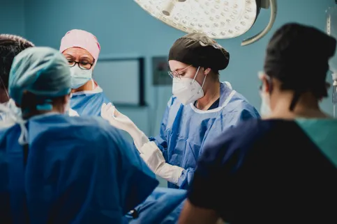 Doctors around an operating table