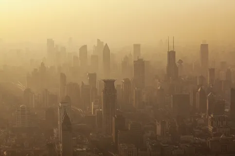 Air pollution seen over Shanghai's Puxi District buildings at dusk 