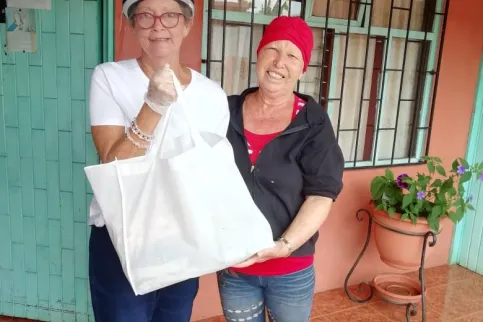 Staff at Asociación Tour Rosa de Costa Rica provide essential supplies and support to cancer patients during COVID-19