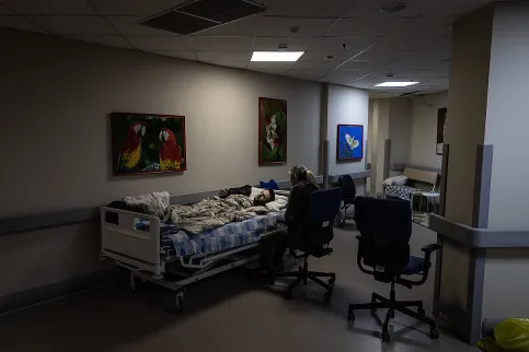 Photo by Chris McGrath/Getty Images: A patient rests in the bomb shelter of the Oncology ward at Okhmatdyt Children's Hospital on February 28, 2022 in Kyiv, Ukraine.