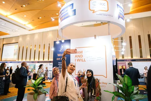 Participants at the 2018 World Cancer Congress sharing their "I Am and I Will" message