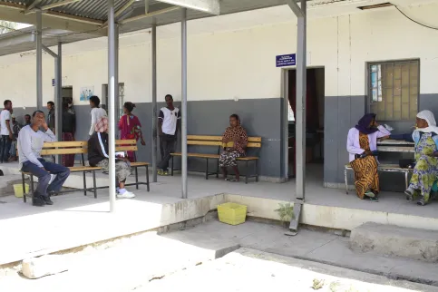 People waiting outside a clinic in a rural area of Ethiopia