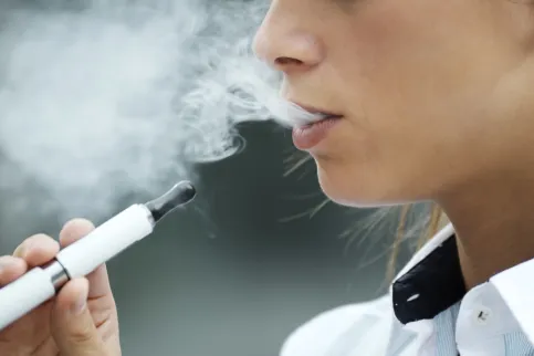 E-cigarettes contain nicotine that makes them addictive as well as chemicals whose long-term impact on health is still relatively unknown