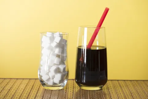An illustration of how much sugar a soda contains.