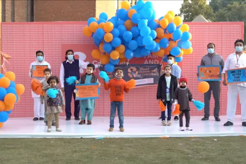 Members of Shaukat Khanum Memorial Cancer Hospital and Research Centre in Pakistan celebrate World Cancer Day