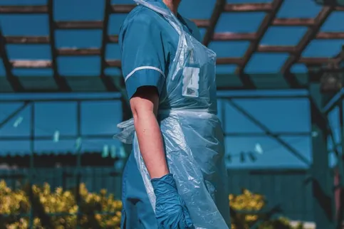 Nurse wearing a mask and protective gear
