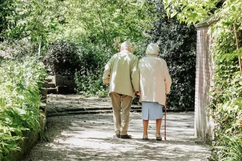2 elderly walking