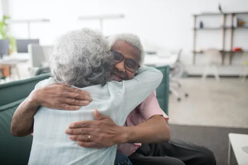Woman hugging her husband
