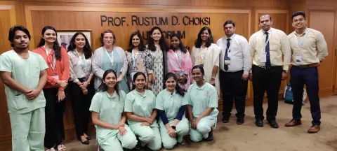 Group of doctors posing for the picture in reception of Tata Memorial Hospital, India