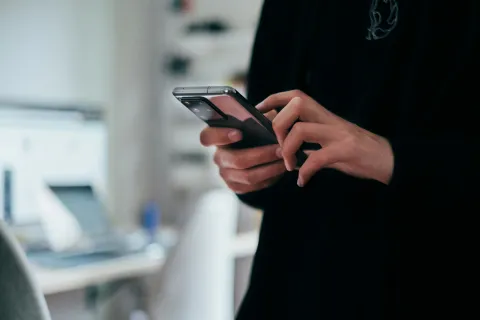 close up of hands on a smartphone