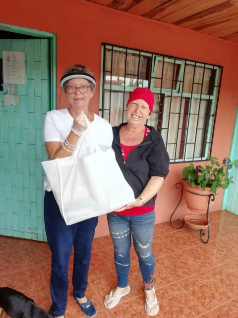 Staff at Asociación Tour Rosa de Costa Rica provide essential supplies and support to cancer patients during COVID-19