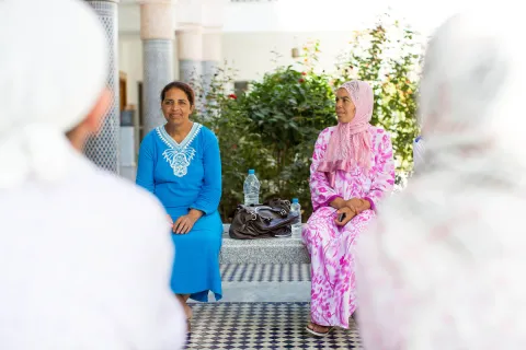 Patients chat in the courtyard of House of Life, free accommodation provided by the Lalla Salma Foundation in Fes, Morocco