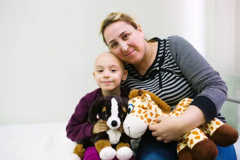 Mother with her child with cancer at the Istanbul University Oncology Institute