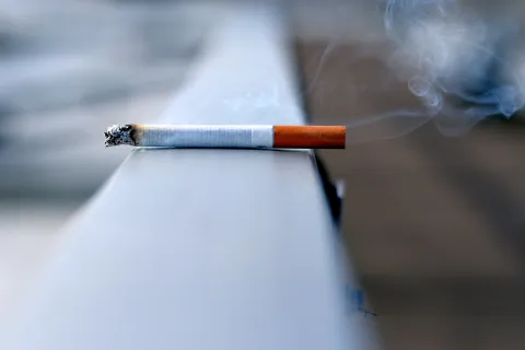 Cigarette burning on a surface