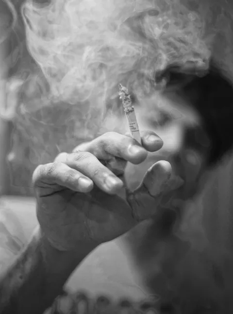 The tobacco industry has been seeking since the 1950s to influence science by funding research that supports its business interests and by suppressing and criticising research unfavourable to its positions. Man smoking a cigarette