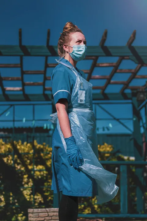 Nurse wearing a mask and protective gear