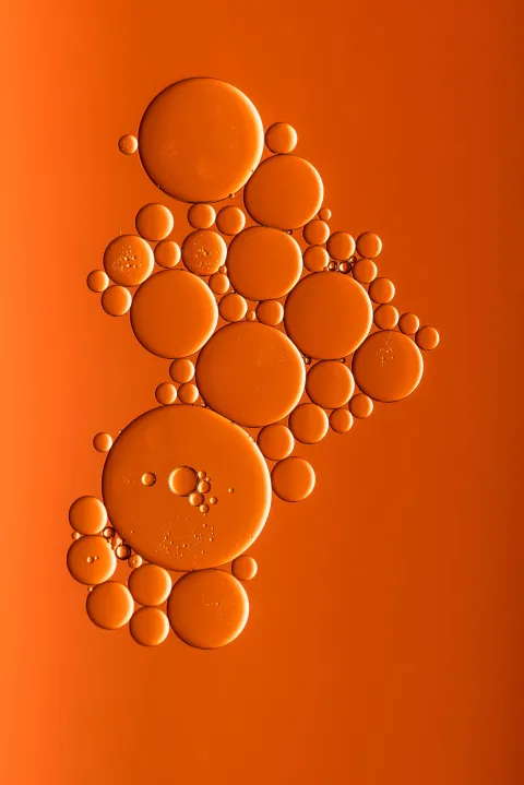 Orange oil bubbles