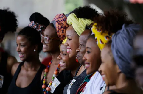 African women smiling, posing for the photo