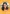 Headshot of Latino woman in branded World Cancer Day material