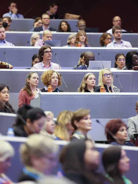 Audience listening to a conference