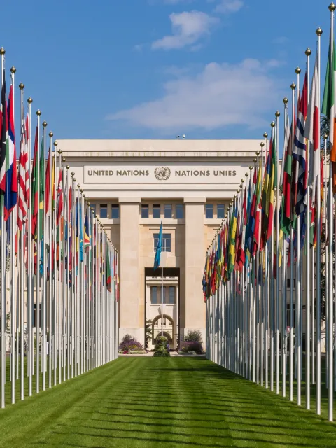 Flags in front of the United Nations building in Geneva, Switzerland