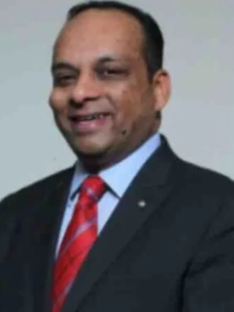 Head shot of Dinesh Madhavan, President Group Oncology and International, Apollo Hospitals Enterprise Ltd, India