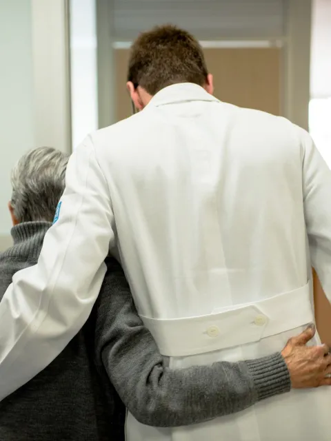 Enrique Soto with a patient 