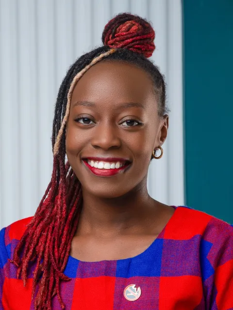 Headshot of Elvina Majiwa, a young woman from Kenya