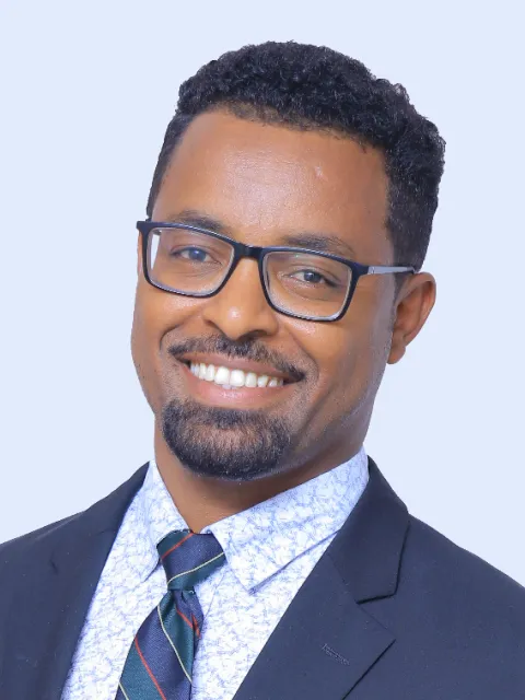 Headshot of Dr Biniyam Tefera Deressa, Assistant Professor of Clinical Oncology at Adama Hospital Medical College in Ethiopia