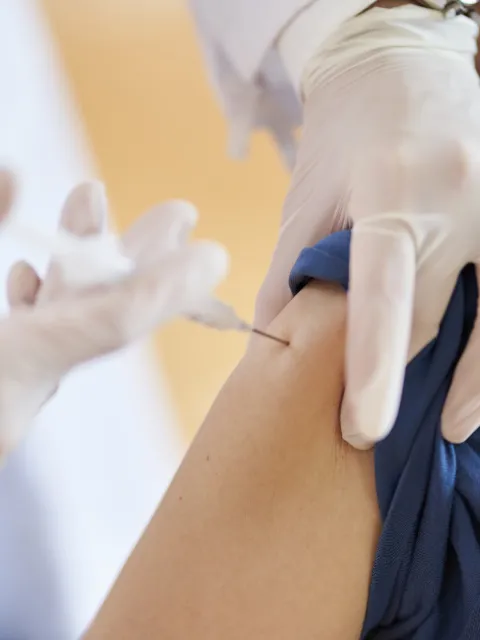 Close up of a patient receiving an injection