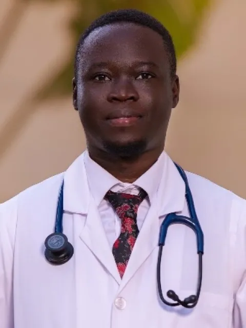 Headshot of a young Black doctor