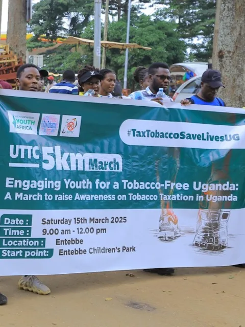 Community members march in support of the excise tax increment on tobacco products in Entebbe Municipality, Uganda